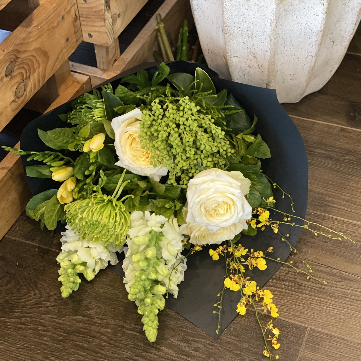 Lime spider, beautiful roses, snapdragons and foliage.